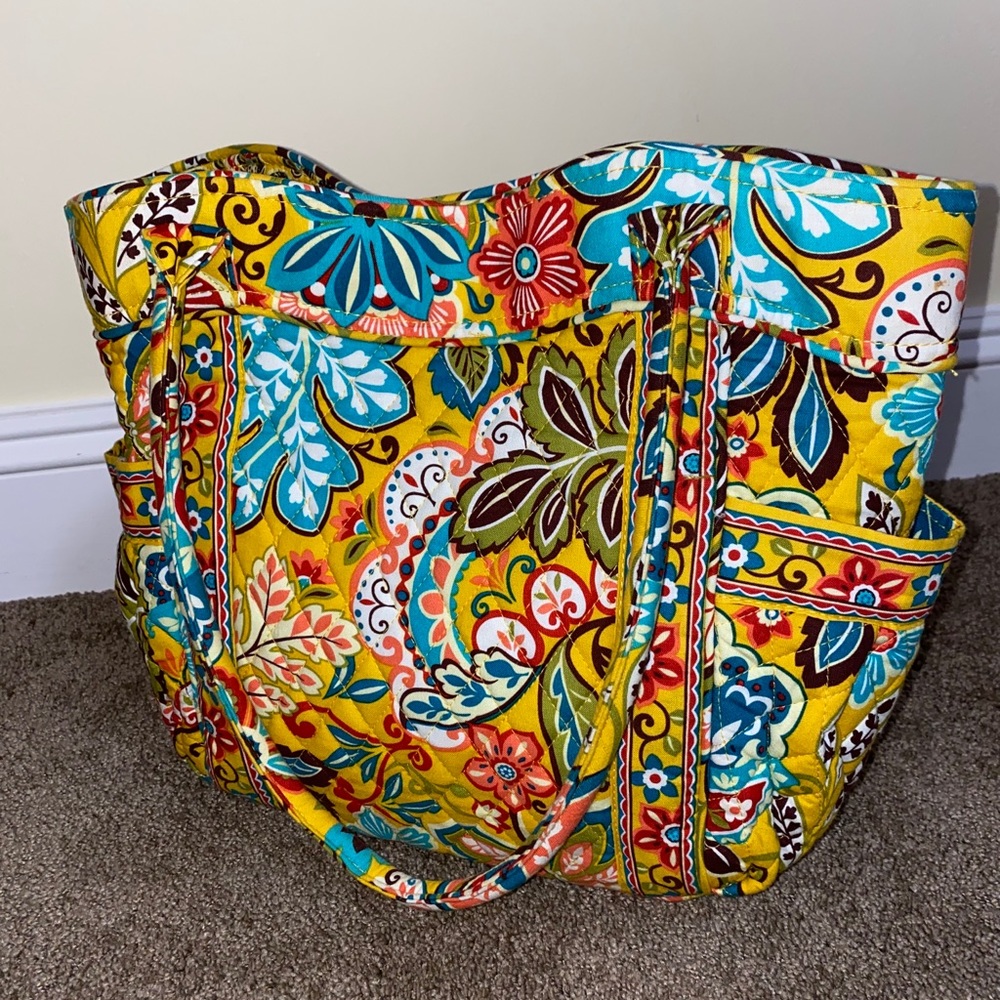 Vera Bradley purse with pockets on outside